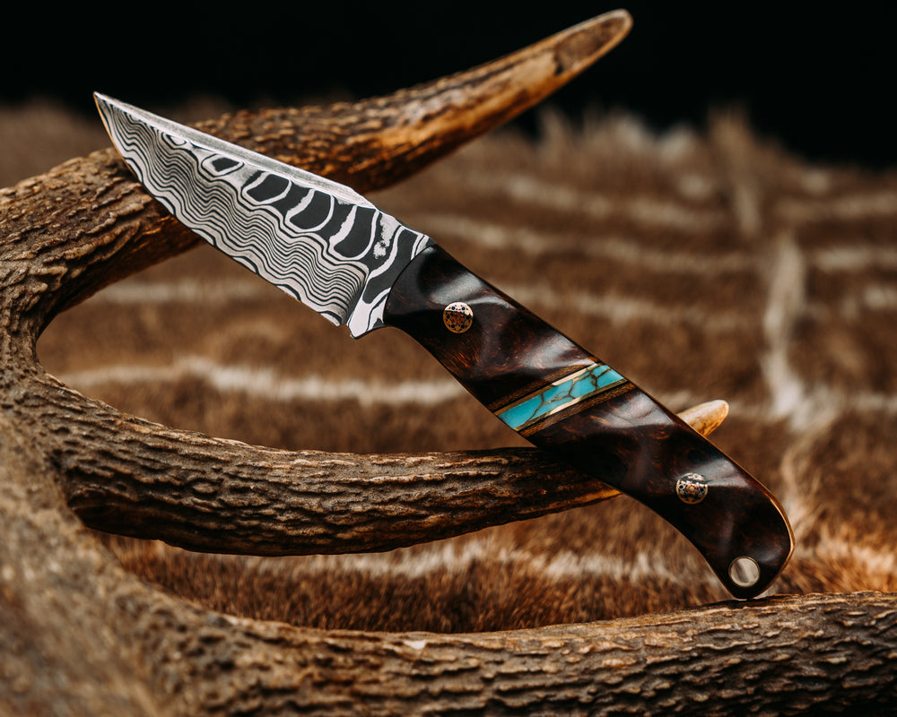 Crow Cub- Baker Forge Zeus Pattern Performance Stainless Damascus- Desert Ironwood, Natural Canvas Micarta, Black G10 and Brass Pin Striping, Turquoise with Gold Matrix Tru-stone Split, Mosaic Pins, Brass Lanyard Pin, Textured Grip