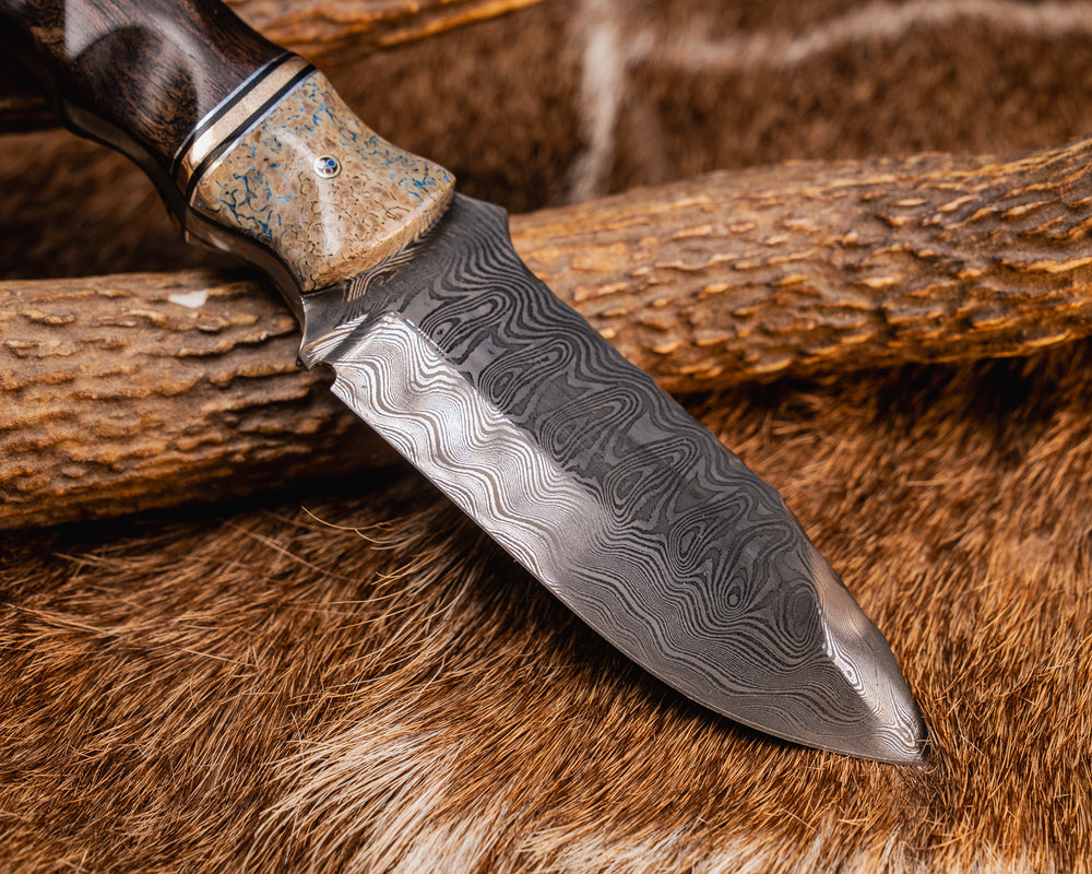 Disaster Cub- Baker Forge Ice Storm Damascus- Dinosaur Bone, Aluminum, Black G10 and Brass Split, Redwood, 1/8" Patriot Mosaic Pin, Patriot Mosaic Pin, Aluminum Lanyard Pin, Textured Grip