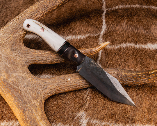 Crow Scout Tanto- Baker Forge Raindrop Pattern Damascus- Walnut, Black G10 and Copper Pin Striping, Bison Horn Split, CO Elk Antler, Copper Pins, Copper Lanyard Pin, Textured Grip