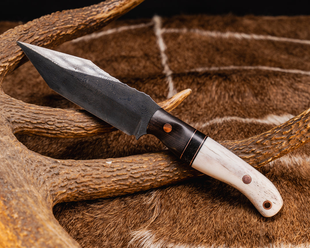Crow Scout Tanto- Baker Forge Raindrop Pattern Damascus- Walnut, Black G10 and Copper Pin Striping, Bison Horn Split, CO Elk Antler, Copper Pins, Copper Lanyard Pin, Textured Grip
