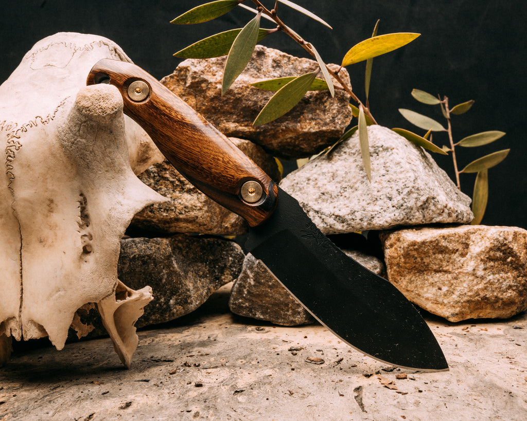 Skinner Jr- Desert Ironwood, Armor black cerakote, brass allen bolts, smooth grip