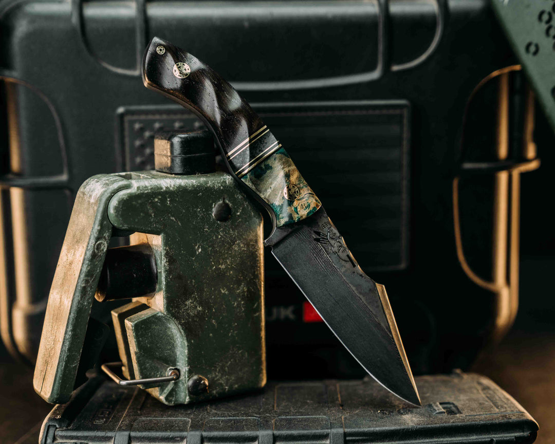Widow Maker Jr- Baker Forge Random Pattern Damascus- Dyed Buckeye Burl, Black G10 and Brass Pin Striping, Black Burlap Micarta Split, Ancient Bog Oak, Brass Mosaic Pins, 1/8" Brass Mosaic Pin, Textured Grip
