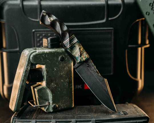 Widow Maker Jr- Baker Forge Random Pattern Damascus- Dyed Buckeye Burl, Black G10 and Brass Pin Striping, Black Burlap Micarta Split, Ancient Bog Oak, Brass Mosaic Pins, 1/8" Brass Mosaic Pin, Textured Grip