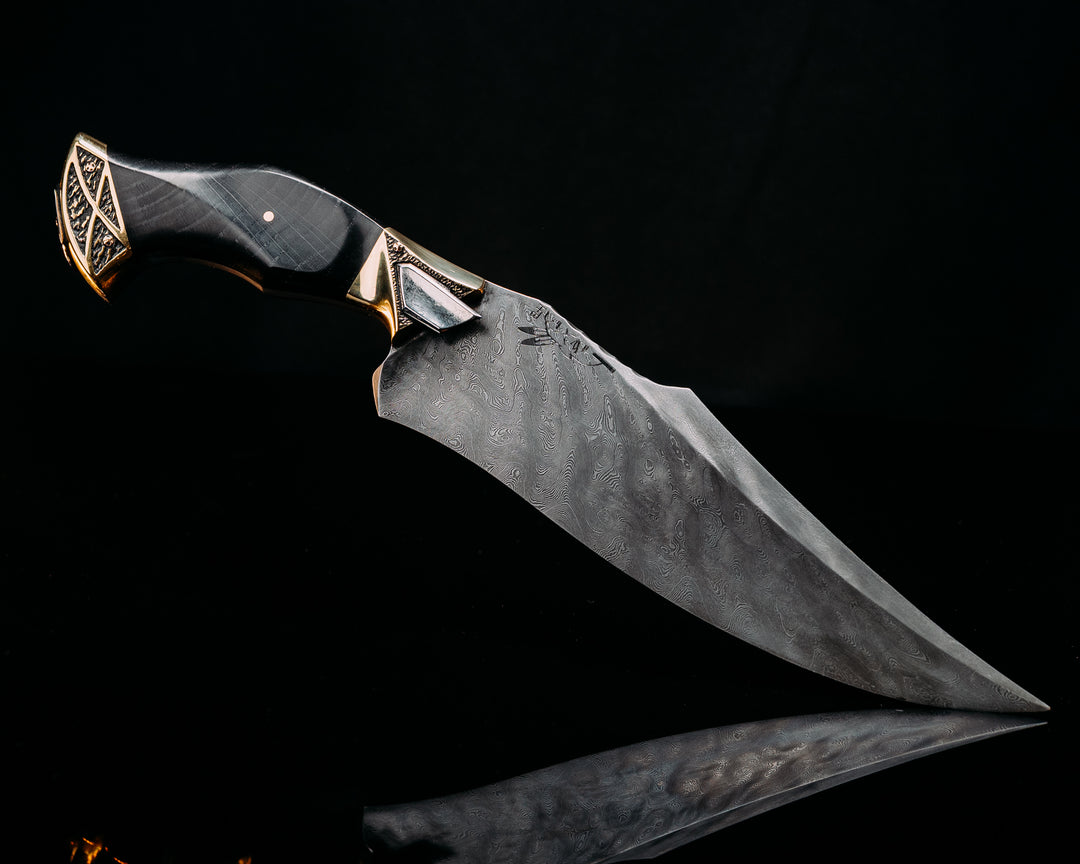 Half Face Blades X Dire Pacific Giveaway - Recurve Fighter - 400 Layered Dire Pacific Forged Damascus - Brass Bolster w/ Crystallized Titanium Guard Inlay, African Blackwood, Solid Brass Pommel, Crystalized Titanium Pommel Cap, Bronze Pins, Textured Grip.
