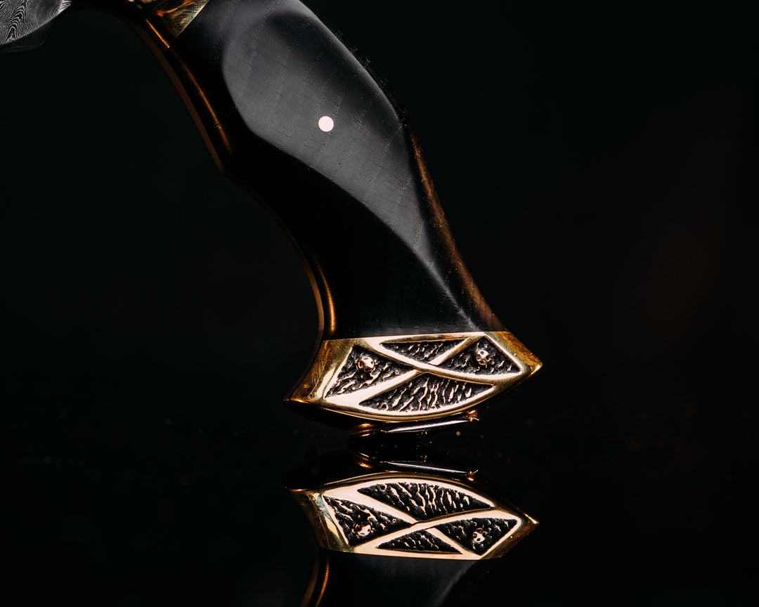 Half Face Blades X Dire Pacific Giveaway - Recurve Fighter - 400 Layered Dire Pacific Forged Damascus - Brass Bolster w/ Crystallized Titanium Guard Inlay, African Blackwood, Solid Brass Pommel, Crystalized Titanium Pommel Cap, Bronze Pins, Textured Grip.