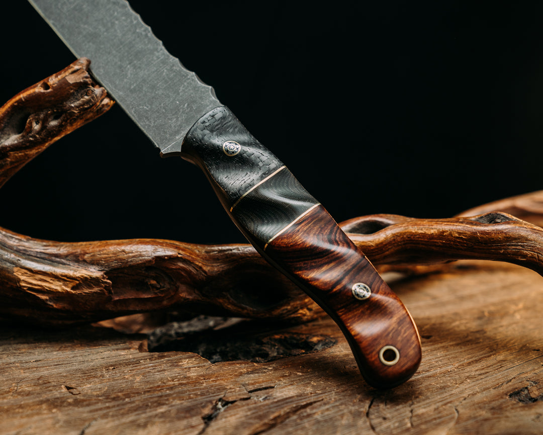 Half Face Blades X Dire Pacific Giveaway - Recurve Fighter - 400 Layered Dire Pacific Forged Damascus - Brass Bolster w/ Crystallized Titanium Guard Inlay, African Blackwood, Solid Brass Pommel, Crystalized Titanium Pommel Cap, Bronze Pins, Textured Grip.