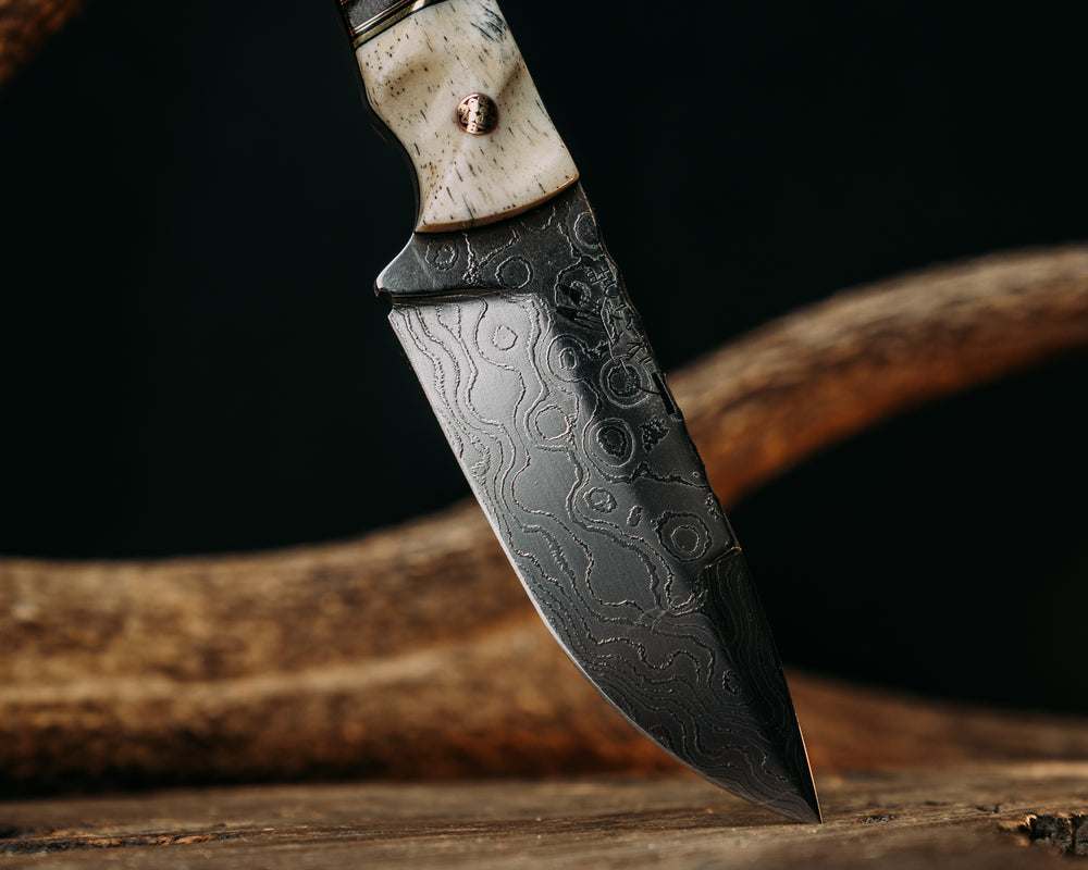 Cavner- Baker Forge Polished Random Pattern Damascus- Giraffe Bone, Black G10, Brass and Cherry G10 Pin Striping, Brown Canvas Micarta Split, Snakewood, Old School CAV Logo Mosaic Pins, Brass Lanyard Pin, Textured Grip